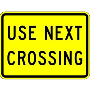 W10-14a 24"x18" Use Next Crossing (plaque) 